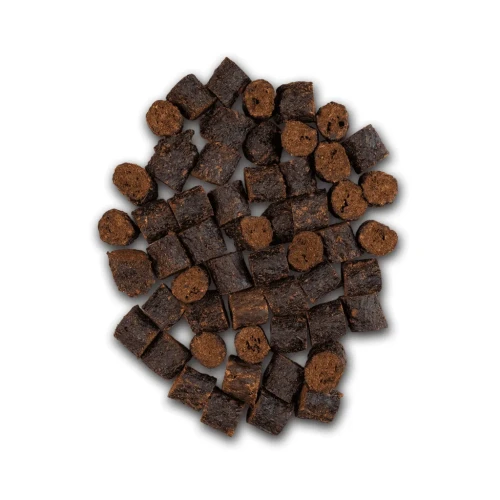 Uniszki Crunchy królik SOFT z miętą i pokrzywą dla psa. Lekkostrawna przekąska wspiera trawienie, oddech, skórę i sierść. Idealna dla wrażliwych psów, z królikiem i ziołami.